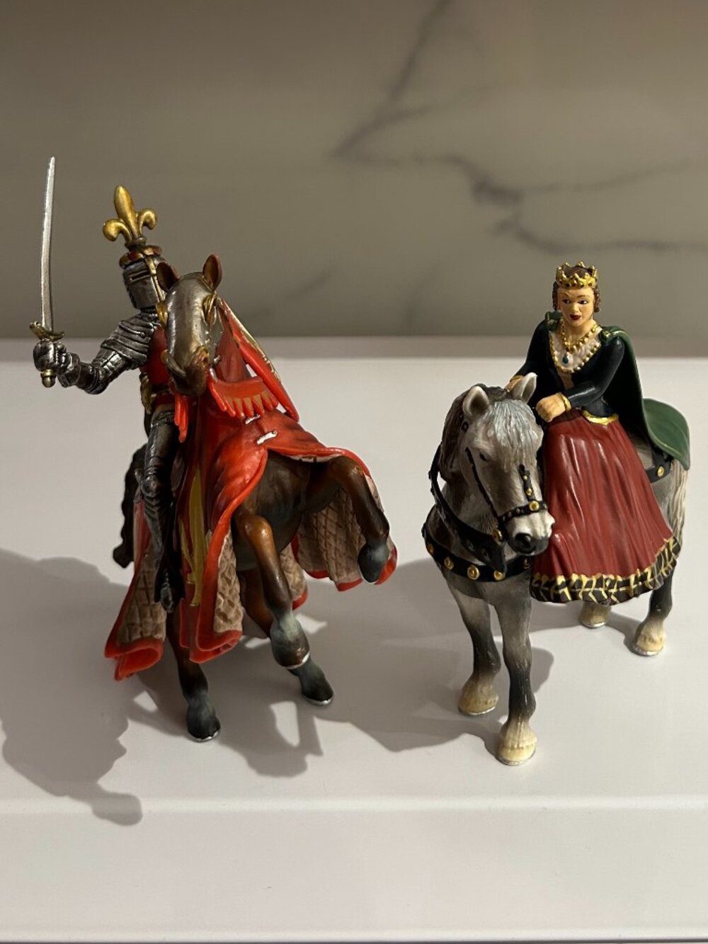 Schleich: Queen on Horseback (70048) and Prince on Reared Horse Red (70018)
